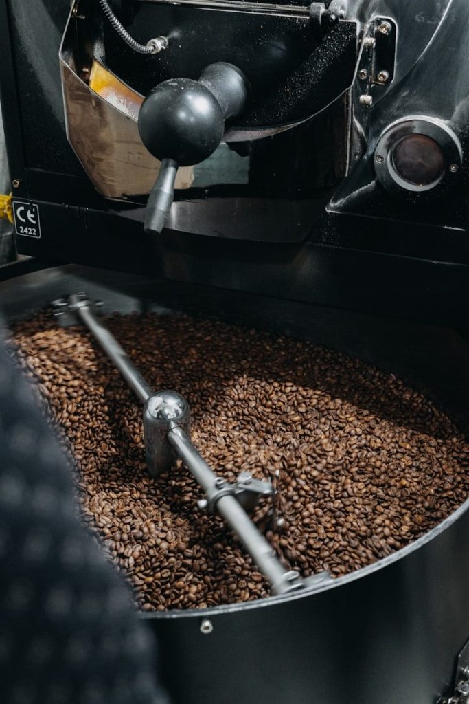 a coffee roaster is filled with coffee beans