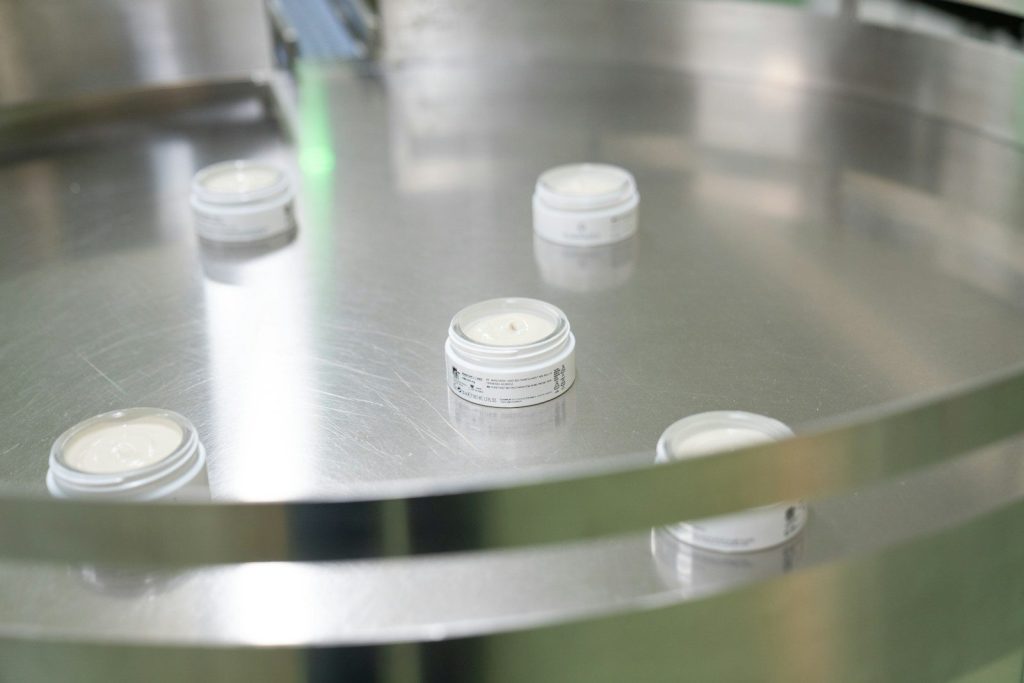 a group of small plastic containers